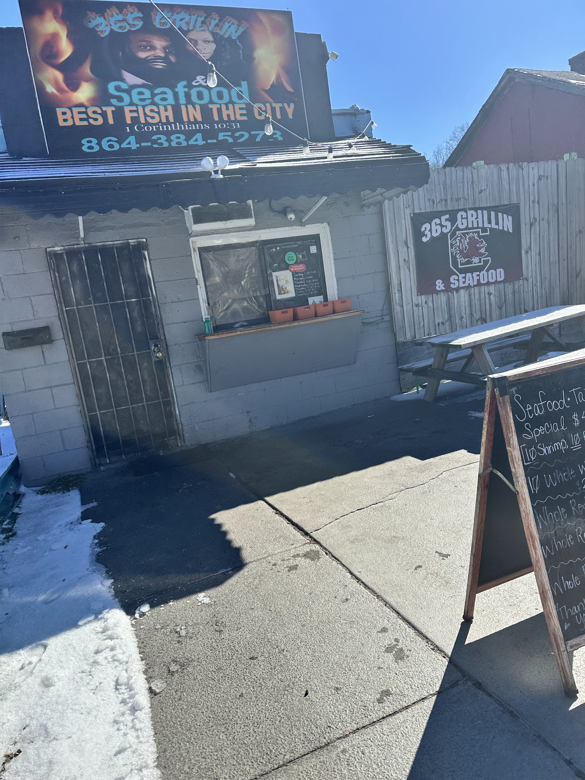 Our walk-up window and sign on John B White Sr Blvd