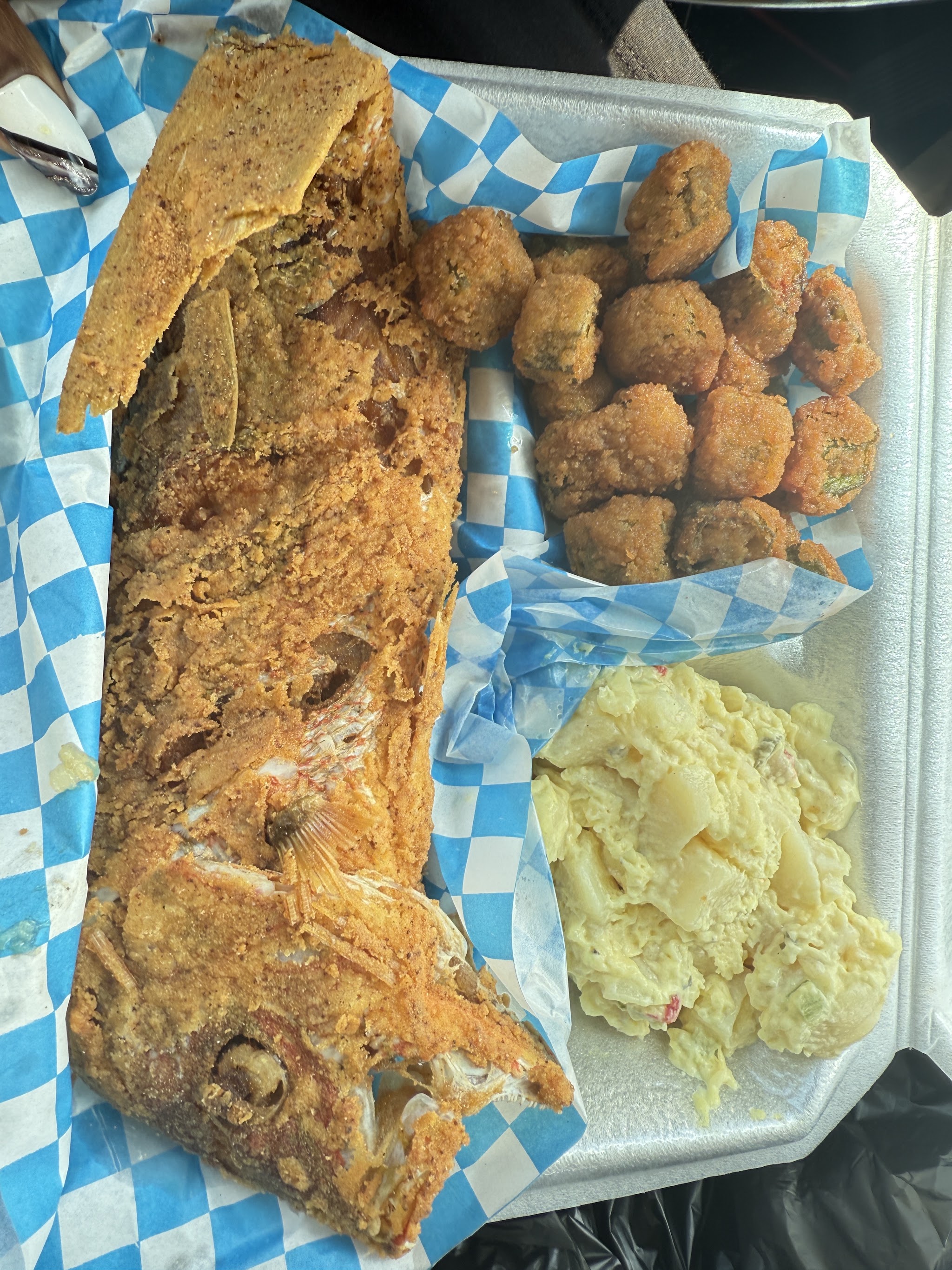 Fried fish with fried okra and potato salad